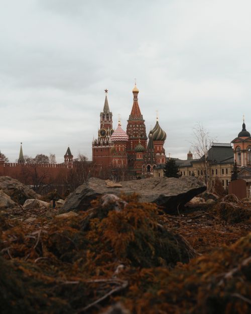 Free Iconic view of St. Basil's Cathedral in Moscow with its colorful onion domes against a cloudy sky. Stock Photo