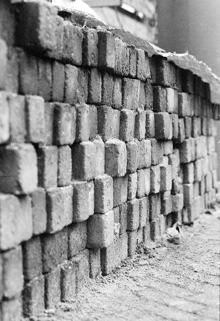 Close-up Of Uneven Brick Wall 