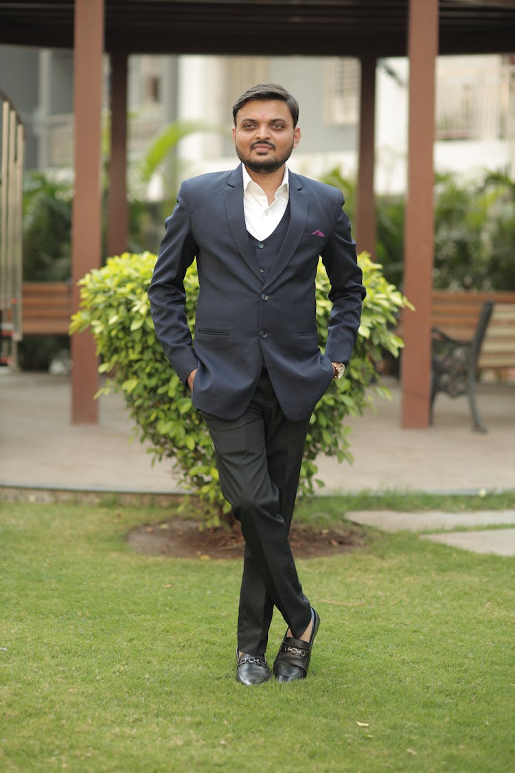 Portrait Of A Man Wearing A Suit