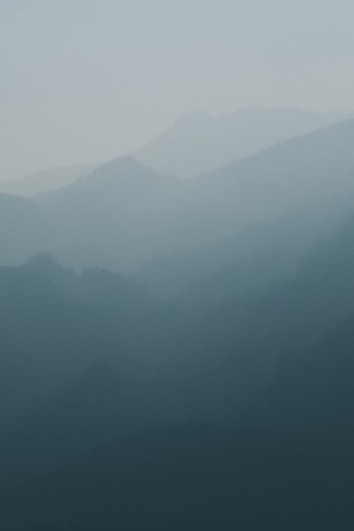 Beautiful Mountains Under White Sky