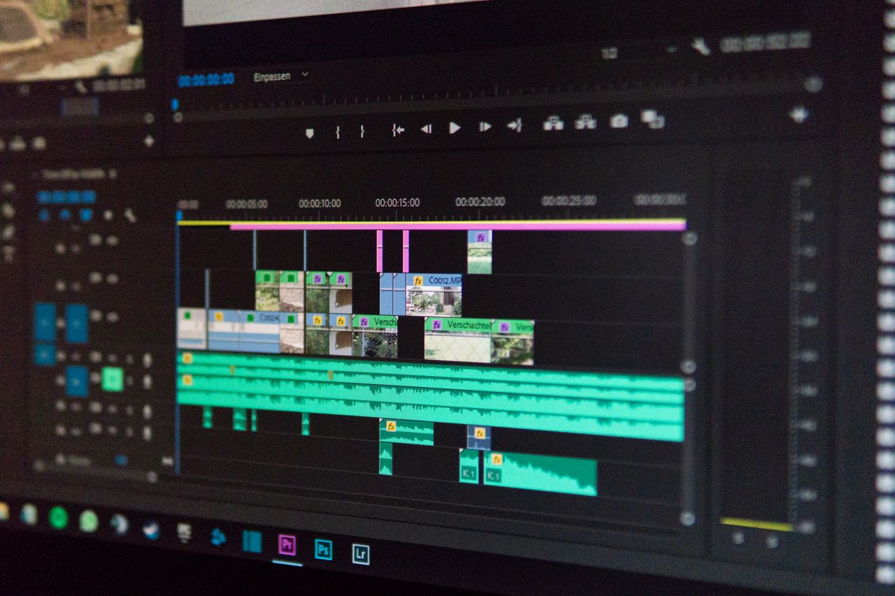 Close-up of a video editing timeline interface on a computer screen, showcasing professional software in action.