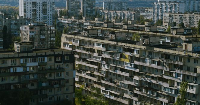 Aerial view of residential buildings in Kyiv showcasing Soviet-era architecture.