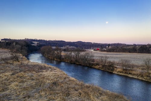 Kostenloses Stock Foto zu bäume, dämmerung, fluss