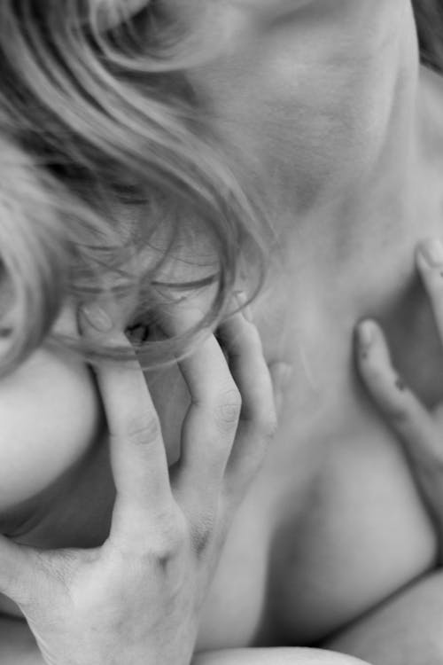 Free Grayscale Photo of Woman in Pain Stock Photo