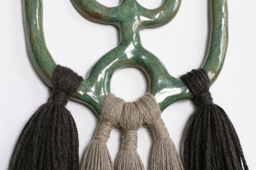 Closeup of a Ceramic Decoration with Fringes