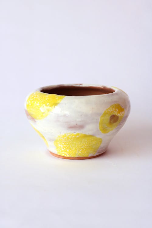 Free White Yellow and Brown Ceramic Vase Stock Photo