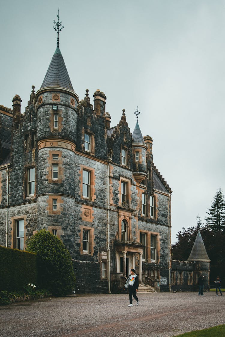 Gray Image Of A Townhouse With Towers