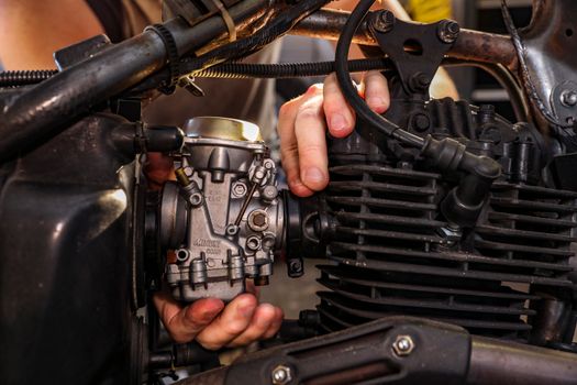 A Hand on Engine of a Vehicle