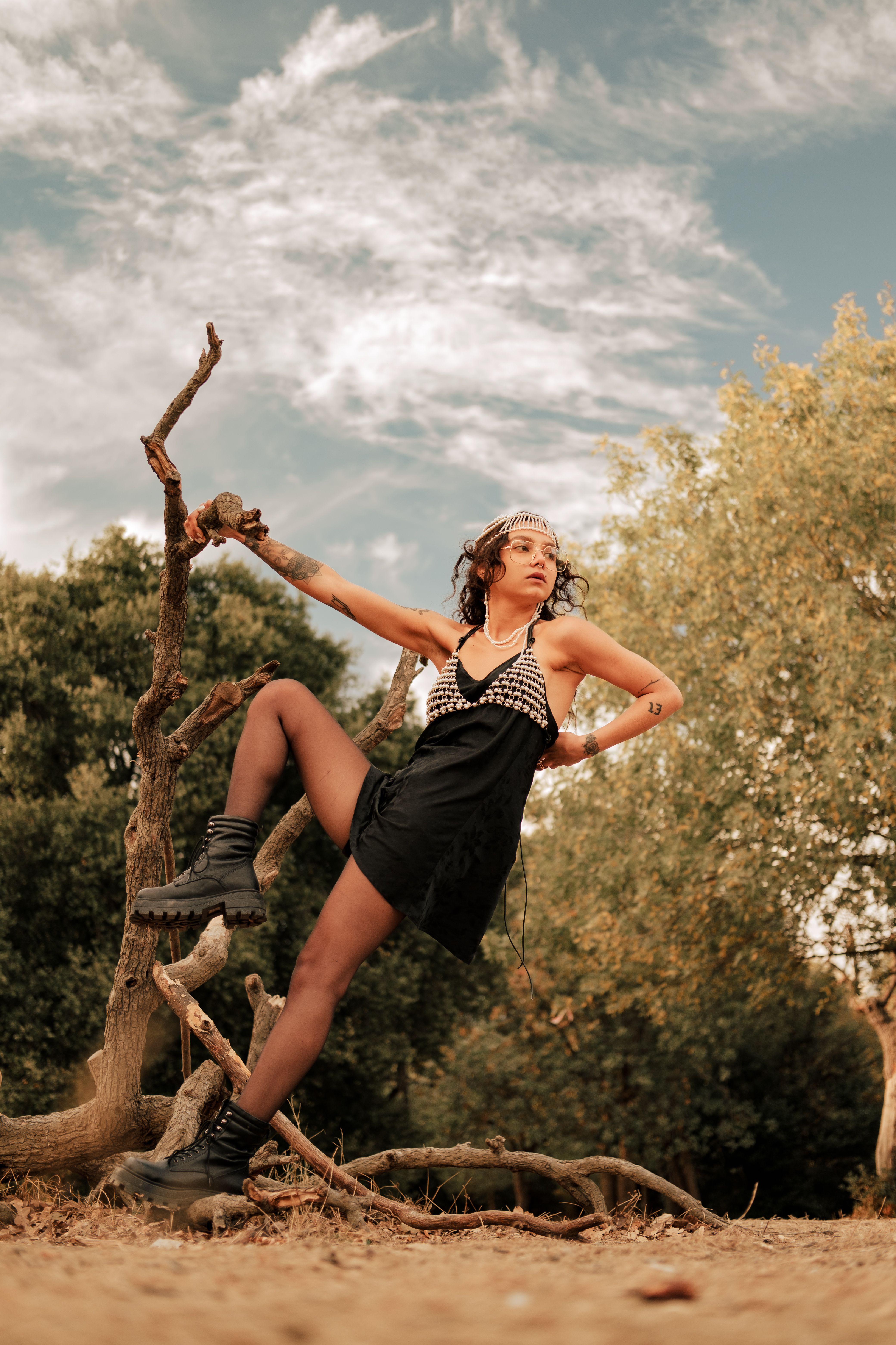 A Woman in Black Dress Posing · Free Stock Photo