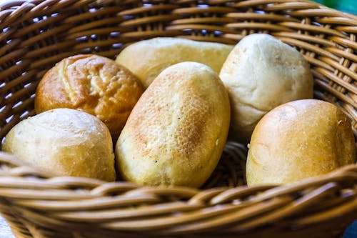 Free Bread In Brown Wicker Basket Stock Photo