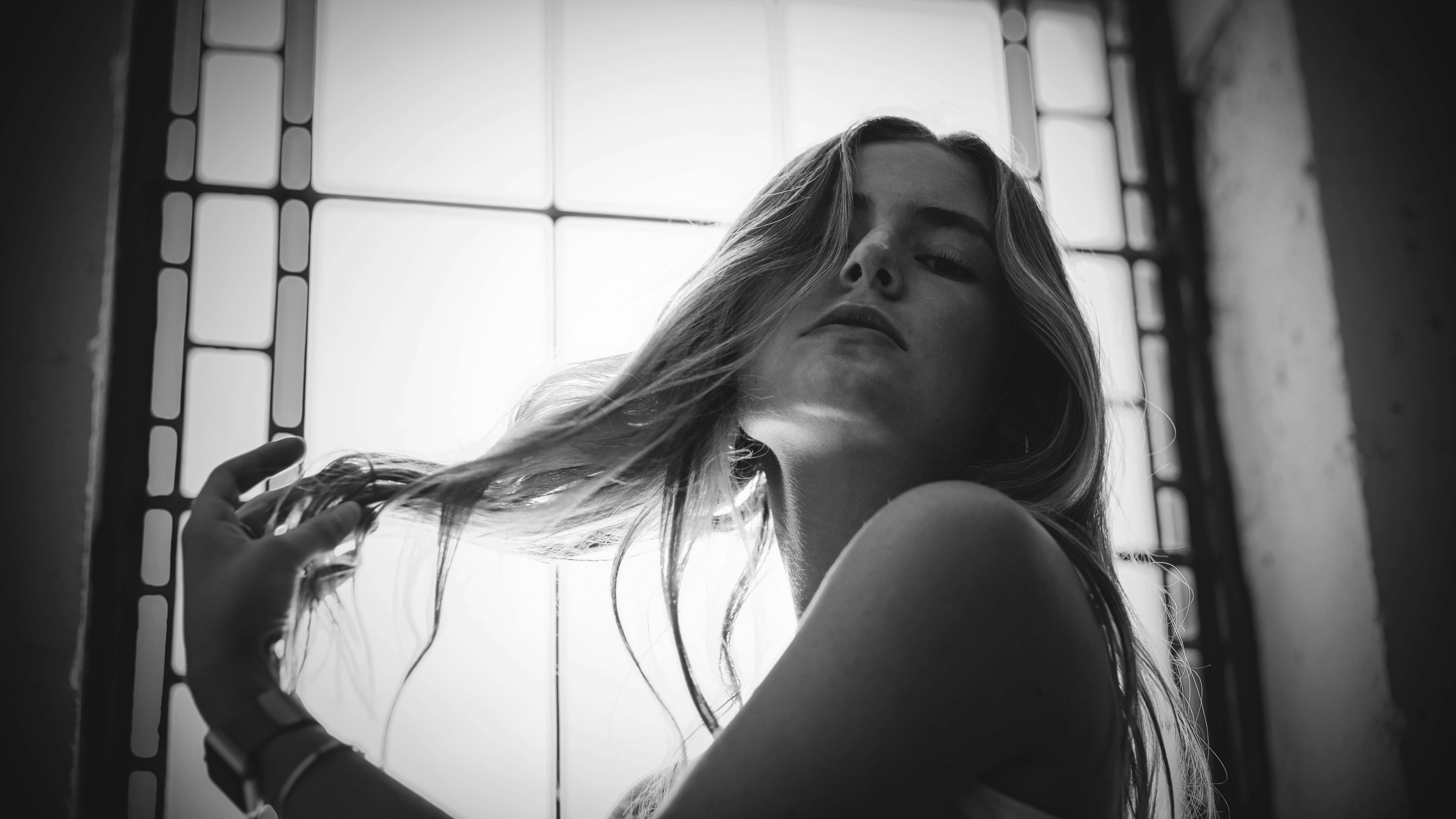 Free Grayscale Photo of Woman in Black Tank Top Stock Photo