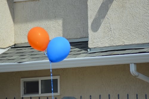 Foto profissional grátis de azul, azul laranja, ballons