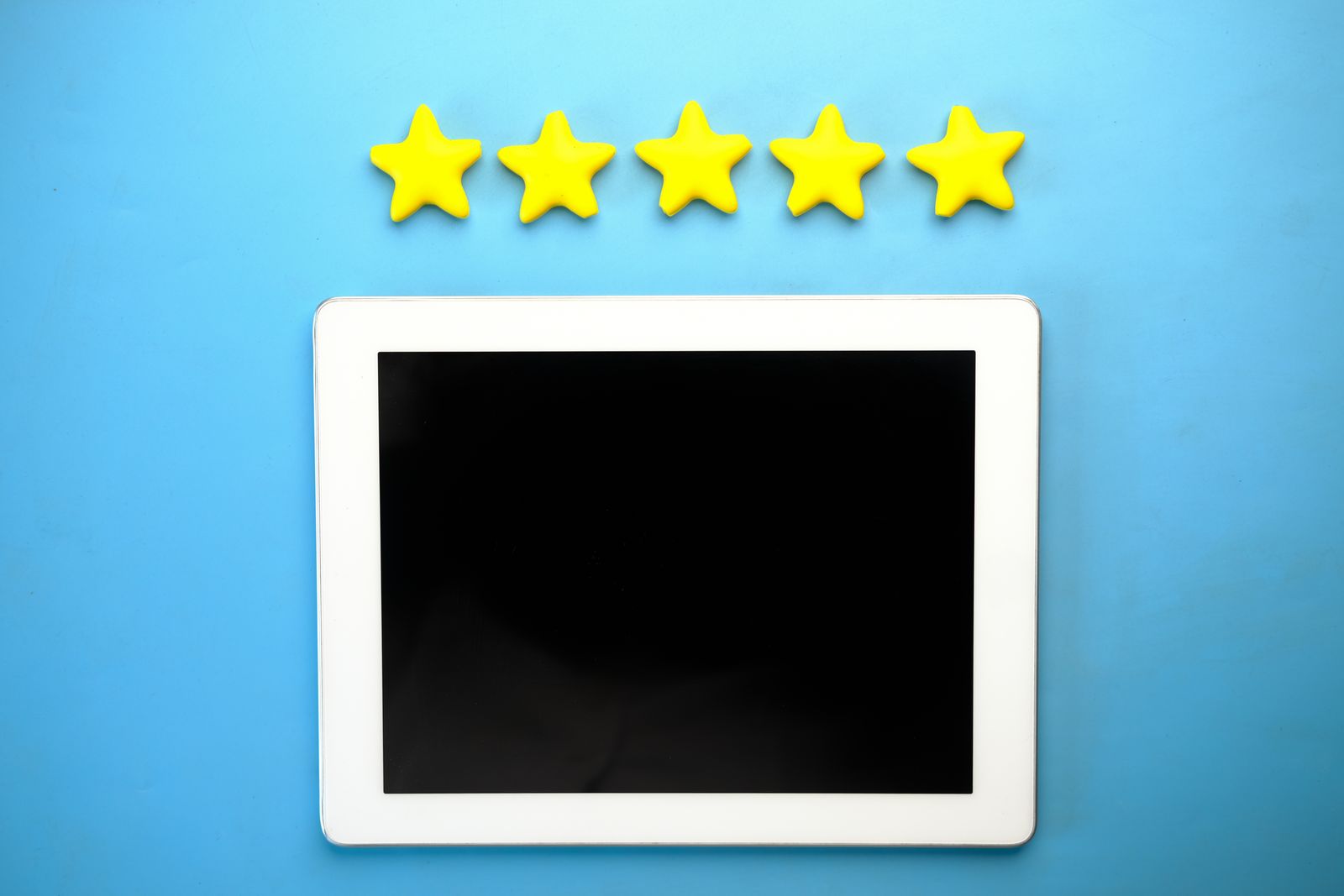 A tablet showing a five star rating