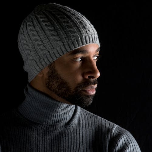 A Man Wearing a Knitted Cap