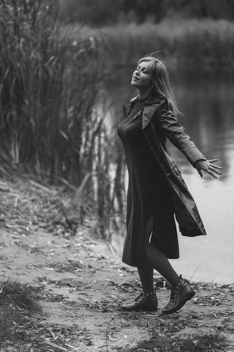 Woman Dancing On The Lakeshore