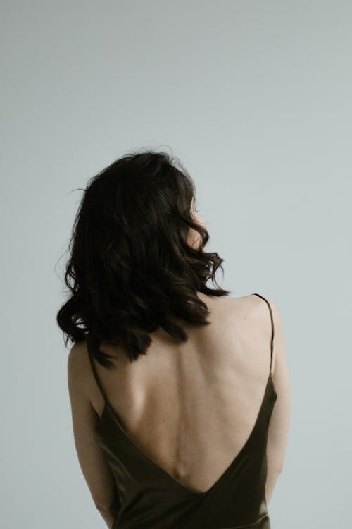 Безкоштовне стокове фото на тему «вертикальні постріл, вид ззаду, жінка»