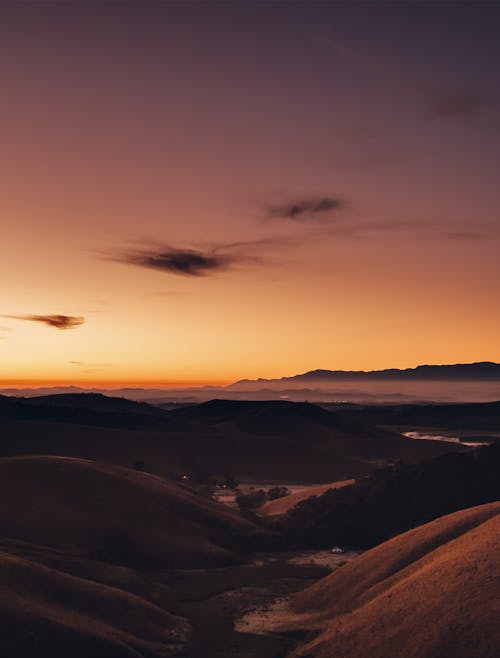 Безкоштовне стокове фото на тему «вертикальні постріл, гори, Захід сонця»