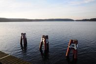 Photograph of Buoys Near a Dock