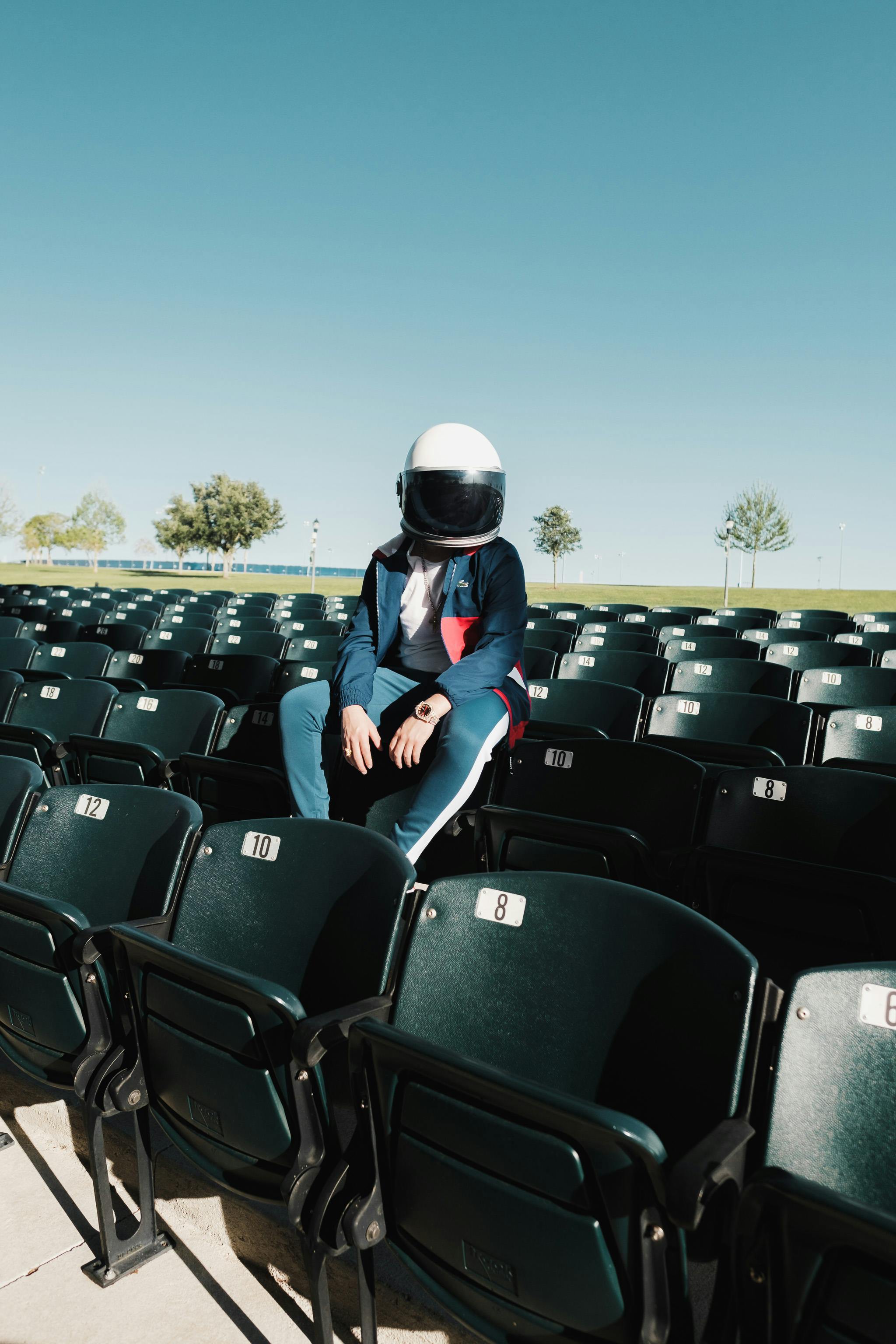 photo of a person in a blue jacket wearing a helmet