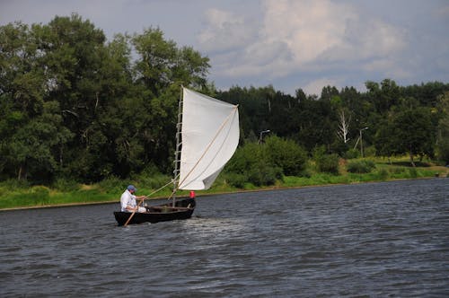 Free stock photo of boat, clouds, river