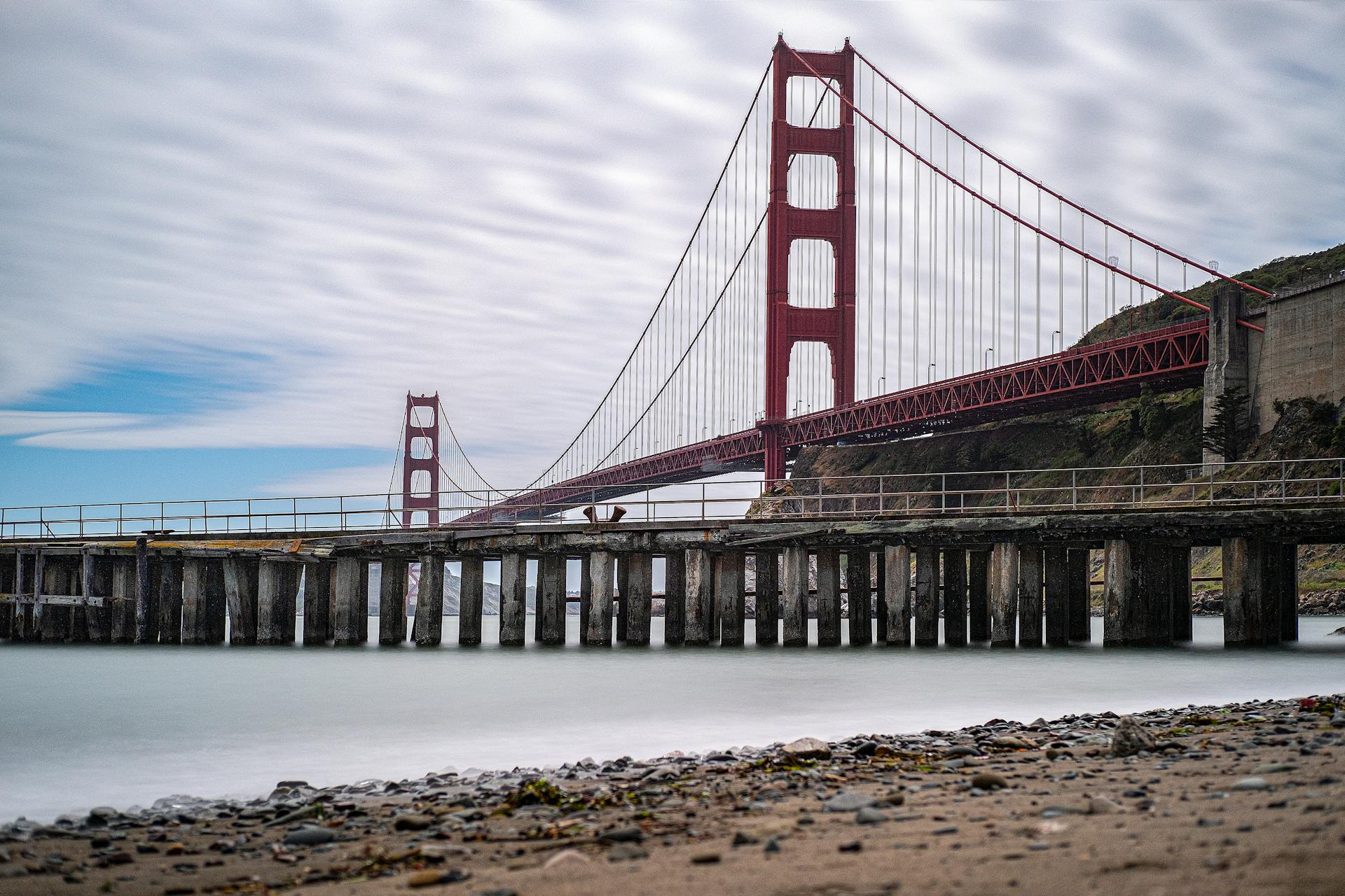 Stunning long exposure of the Golden Gate Bridge from the shore in San Francisco.