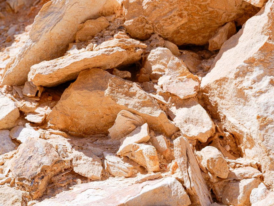 Sun-dried clay material with low-moisture surface texture