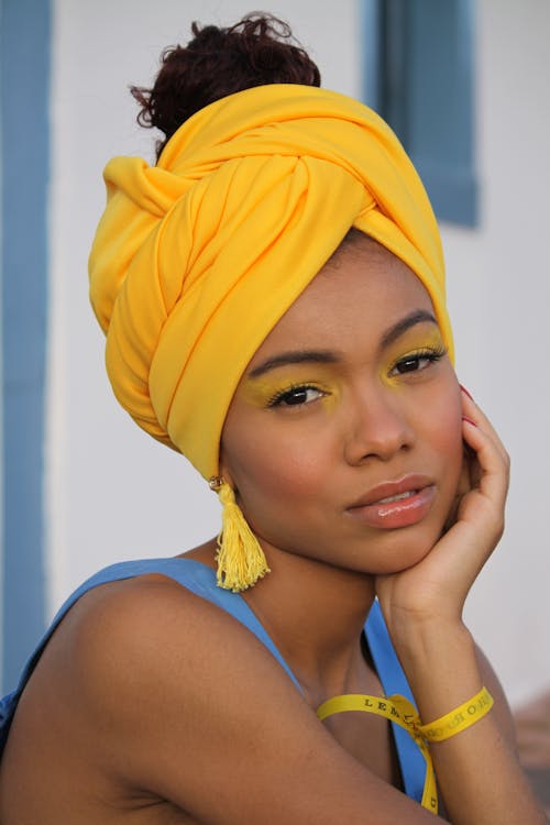 A Woman in Yellow Headscarf