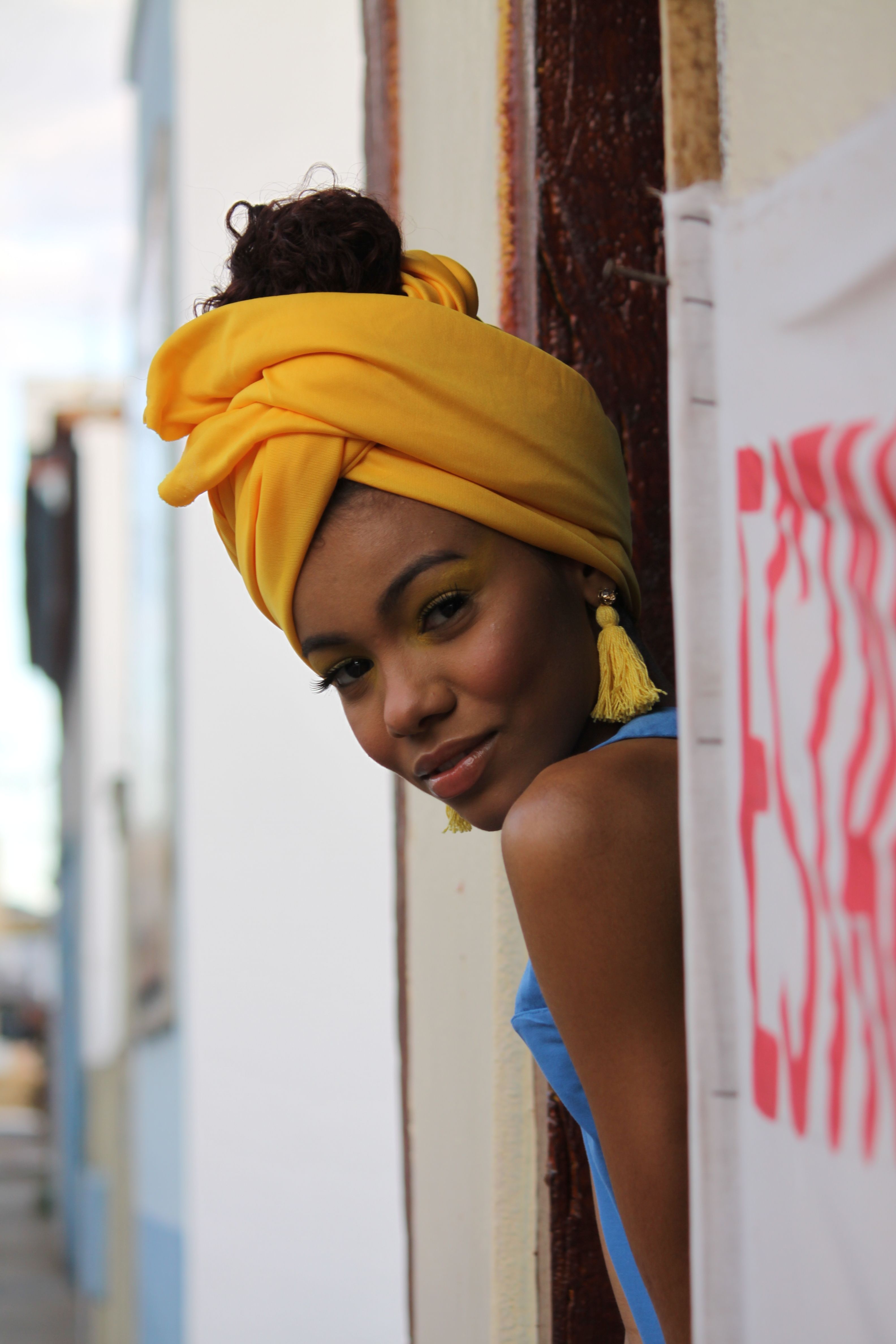 Woman Wearing a Yellow Headwrap