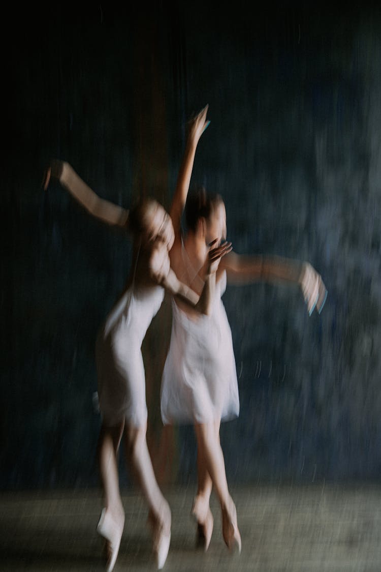 Blurred Image Of Ballerinas Dancing 