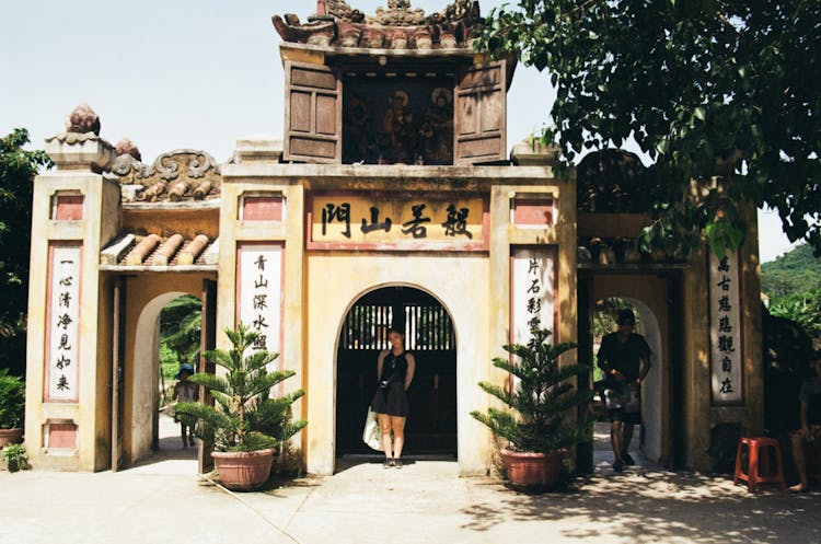 People Posing In Quan Thanh Temple