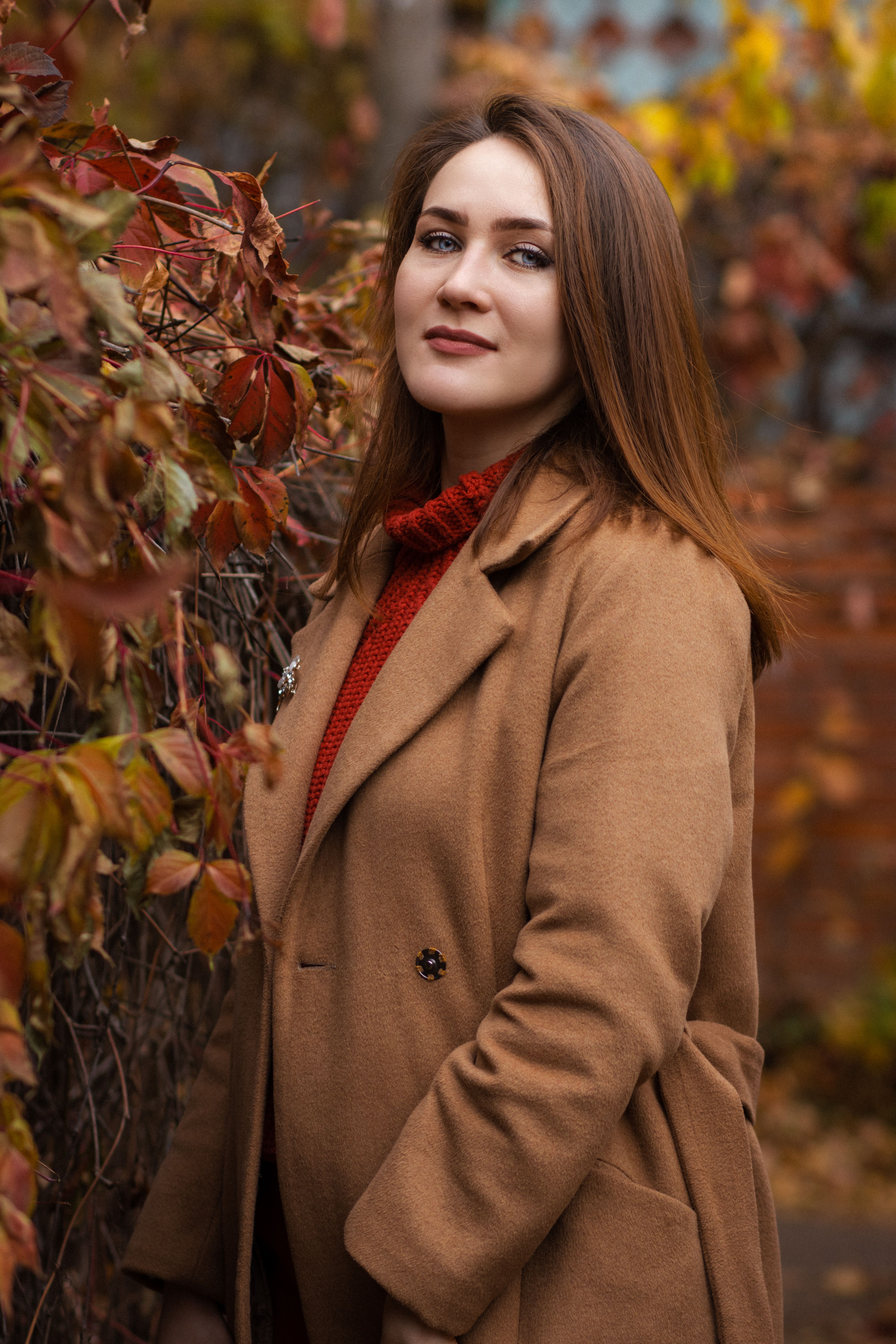 A Woman in Brown Coat Standing · Free Stock Photo