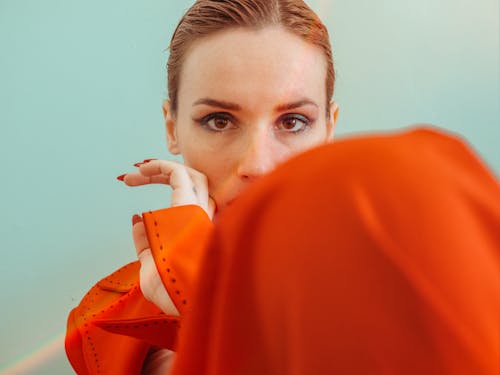 A Woman in Red Long Sleeve Shirt