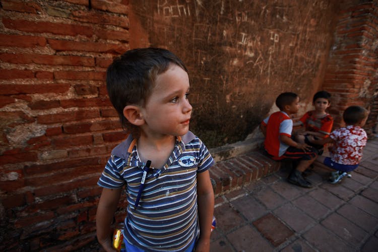 Photograph Of A Child Looking Away