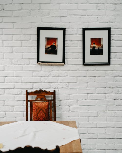 Picture Frames on a White Brick Wall