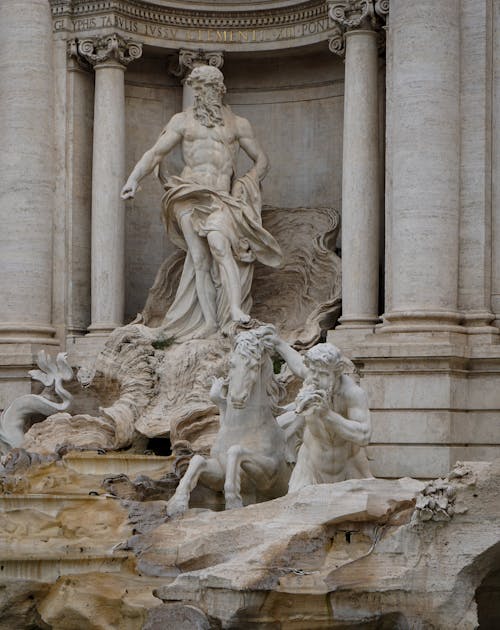 Free Statue of Oceanus at Trevi Fountain in Rome, Italy Stock Photo