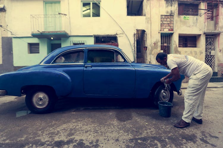 Man Washing Vintage Car