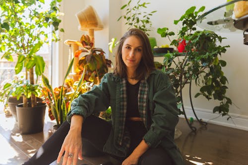 A Woman in Green Jacket