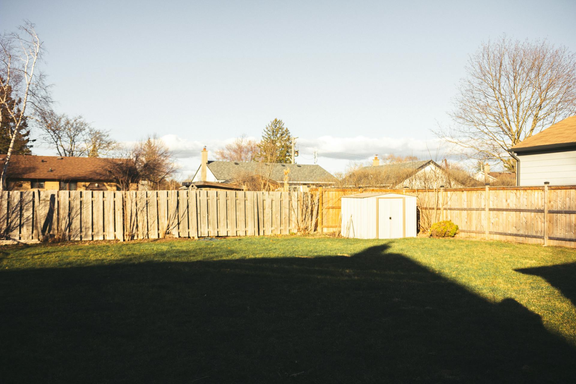 Wooden Shed on a Backyard