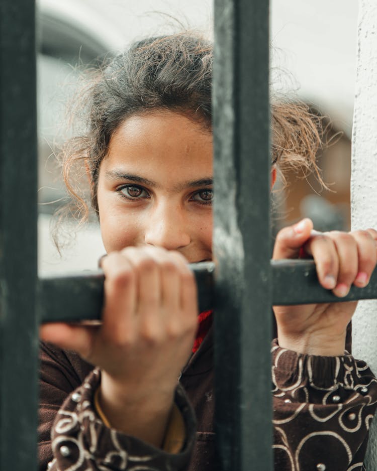 Woman Holding Bars