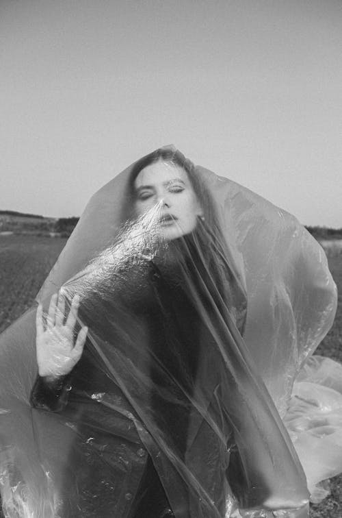 Free Grayscale Photo of a Woman Covered in Plastic Stock Photo