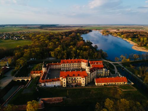 Free Stunning aerial shot of Nesvizh Castle and surrounding landscape in Belarus. Stock Photo