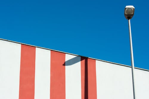 Free White and Red Striped Wall Stock Photo