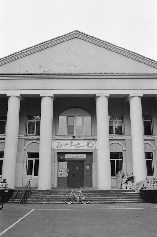 Grayscale Photo of a Concrete Building