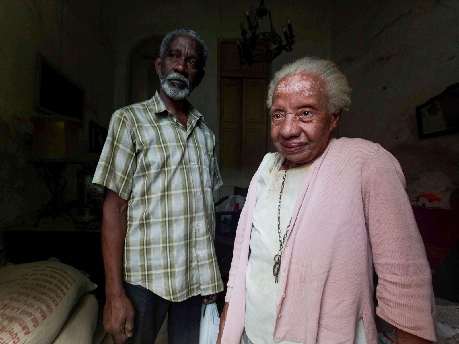 Older couple smiling together at home