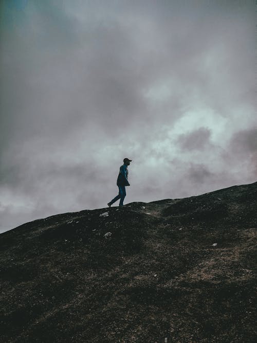 A Man Walking on the Mountain