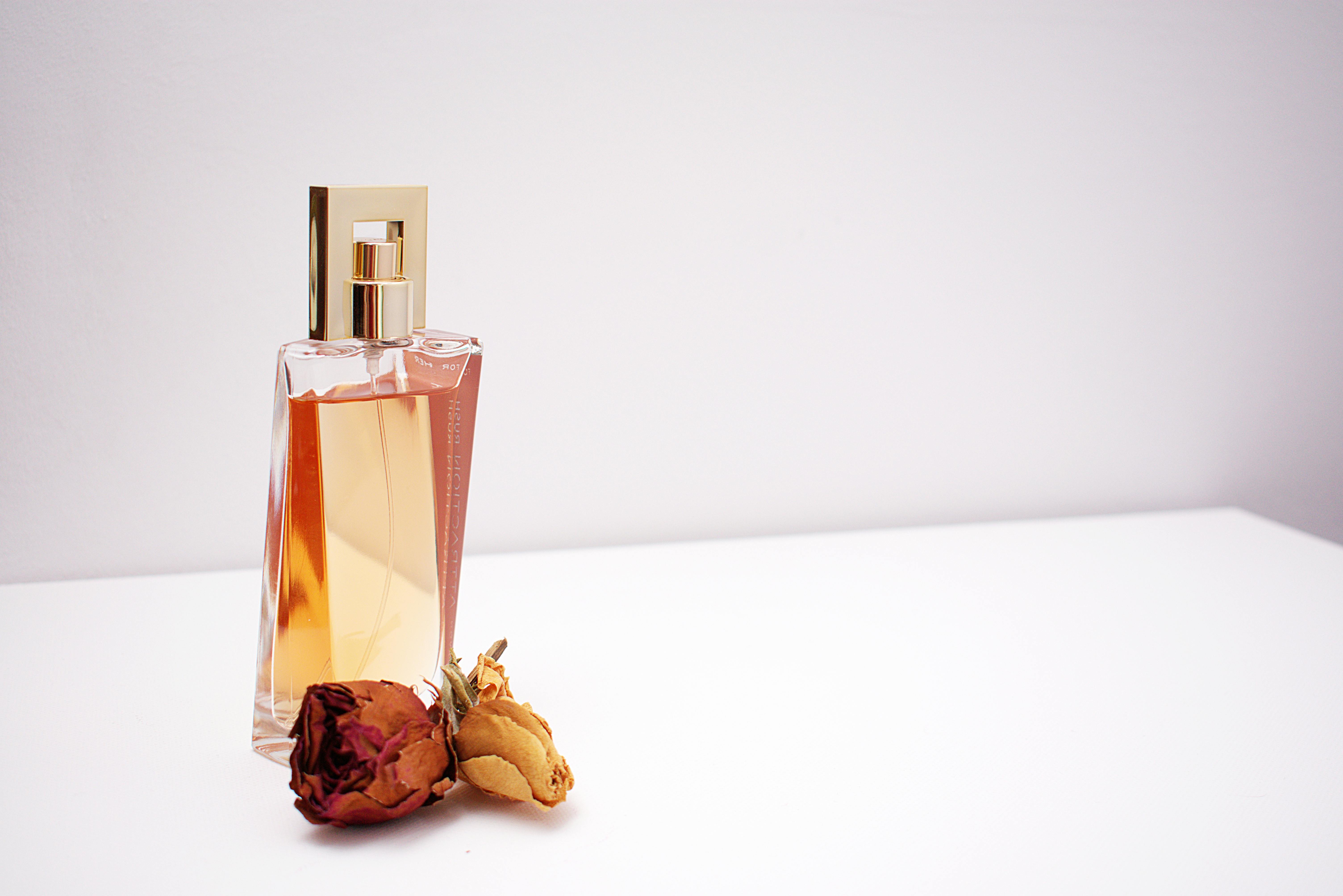 Perfume Bottle on Stone Podium - a Royalty Free Stock Photo from Photocase