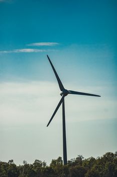 White Windmill Under Blue Sky