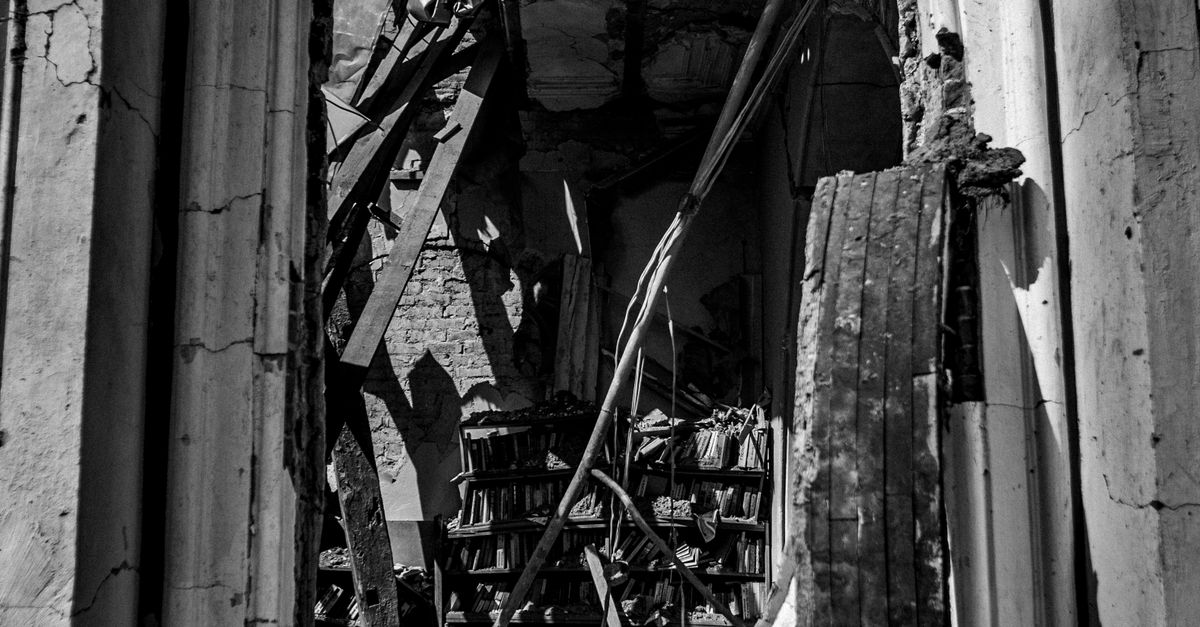 Ruins and Rubble by an Library Archway · Free Stock Photo