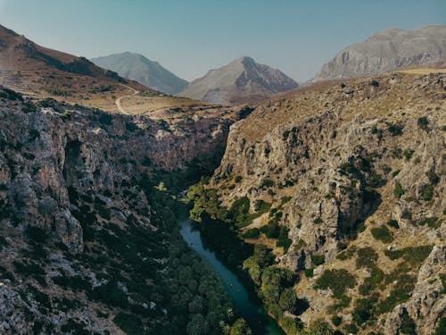 Aerial View of a River between Mountains