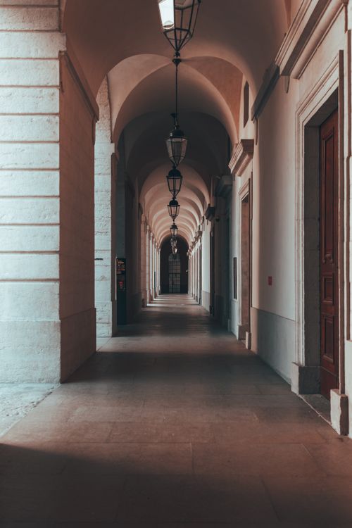 Free Explore the serene elegance of an architectural corridor in Lyon, Auvergne-Rhône-Alpes, France. Stock Photo